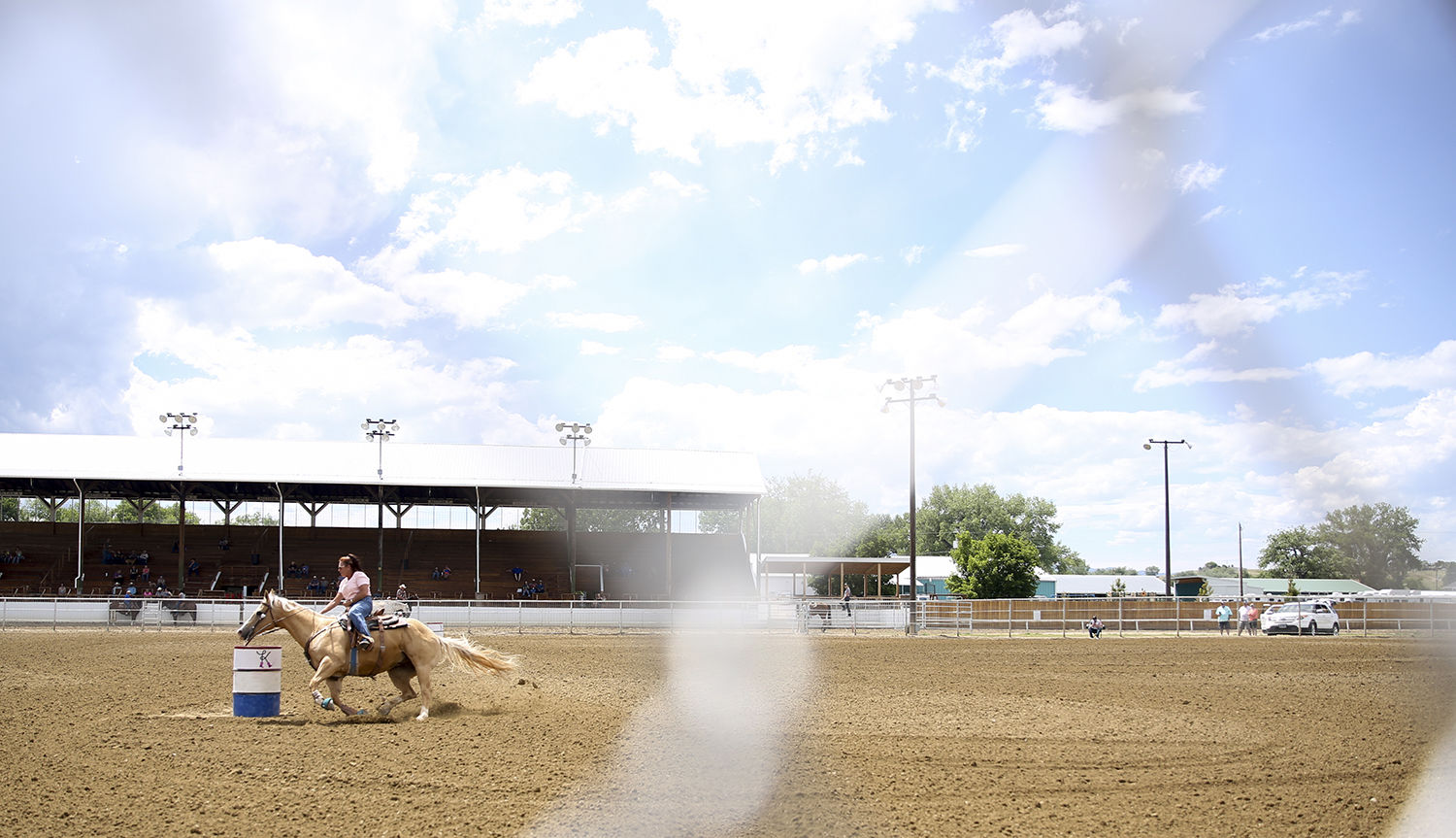 Deb Hepp turns around the first barrel during her run